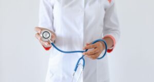 Pradhan Mantri Ayushman Bharat vs Private Health Insurance India 2026
