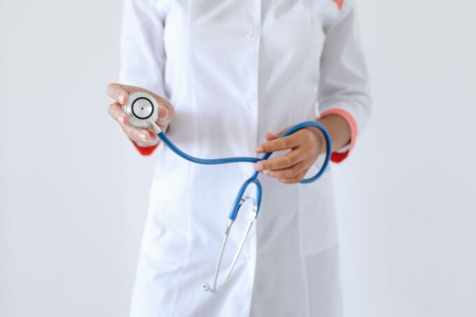 Pradhan Mantri Ayushman Bharat vs Private Health Insurance India 2026
