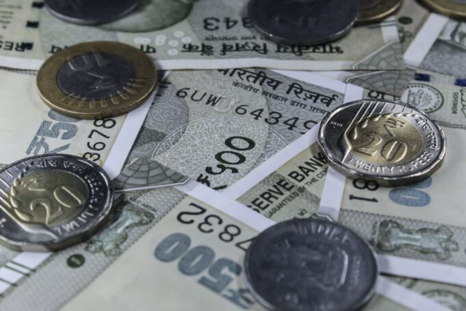 Rupee Falls to 95.76 vs USD: Oil Companies’ Dollar Demand Erases RBI Gains